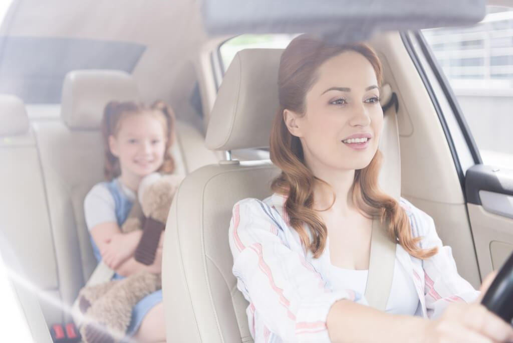 Mom And Daughter In A Car